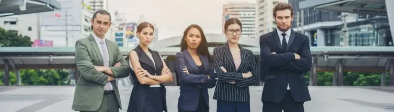 Corporate uniforms UAE employees wearing breathable professional workwear in modern office environments
